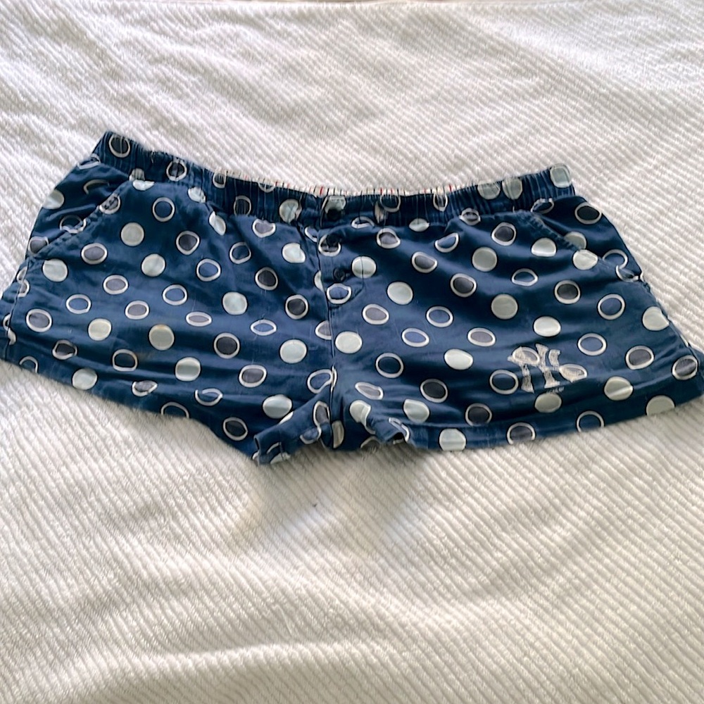 Collective concepts, blue pocadot booty shorts, size medium